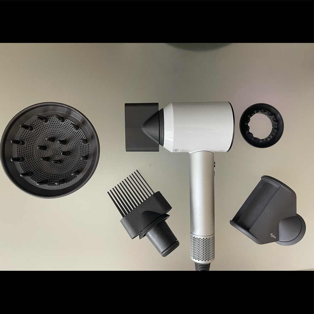 Dyson Supersonic White Hair Dryer. Got it as a gift used 1 timeonly Box included